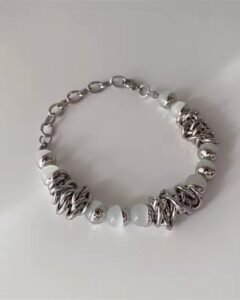 White beaded entangled bracelet